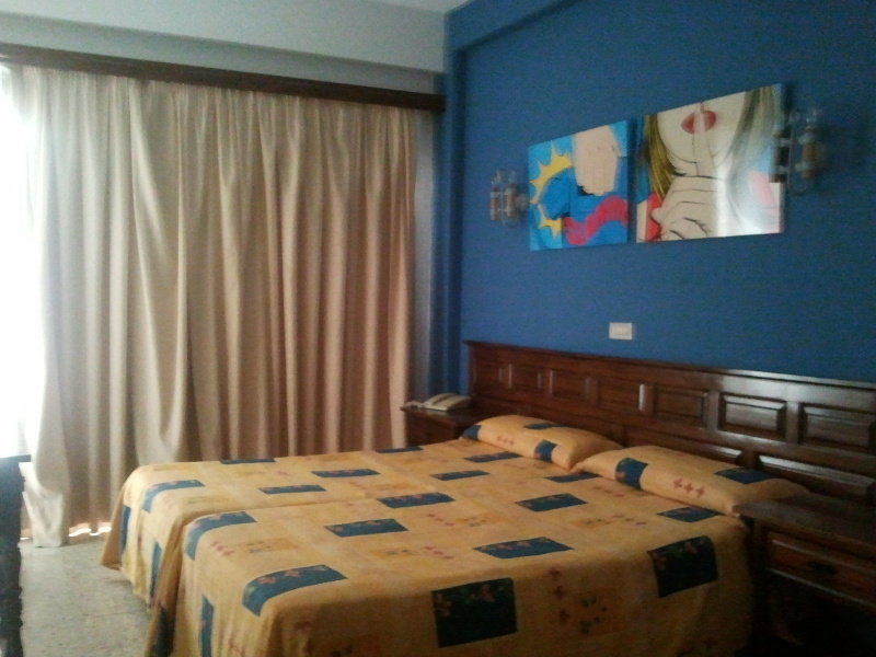 Hotel Tejuma ปูแอร์โตเดลาครูซ ภายนอก รูปภาพ